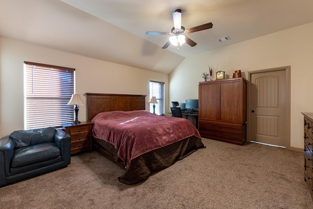 carpeted bedroom featuring lofted ceiling and ceiling fan