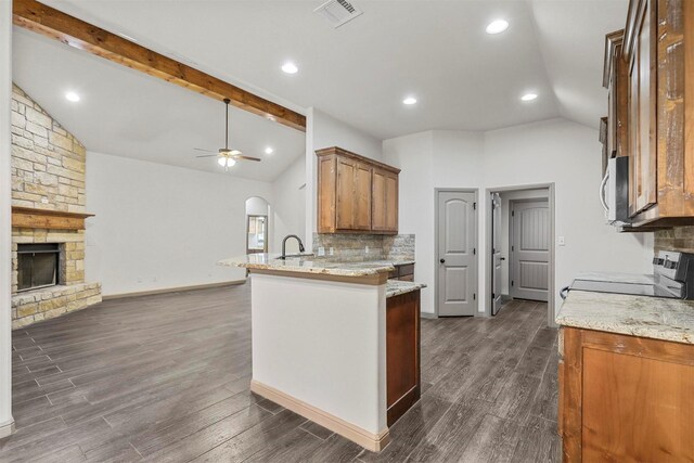 carpeted home office with lofted ceiling