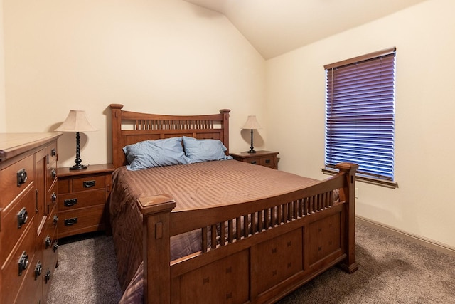 carpeted bedroom featuring vaulted ceiling