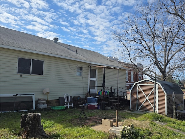 rear view of house with a shed