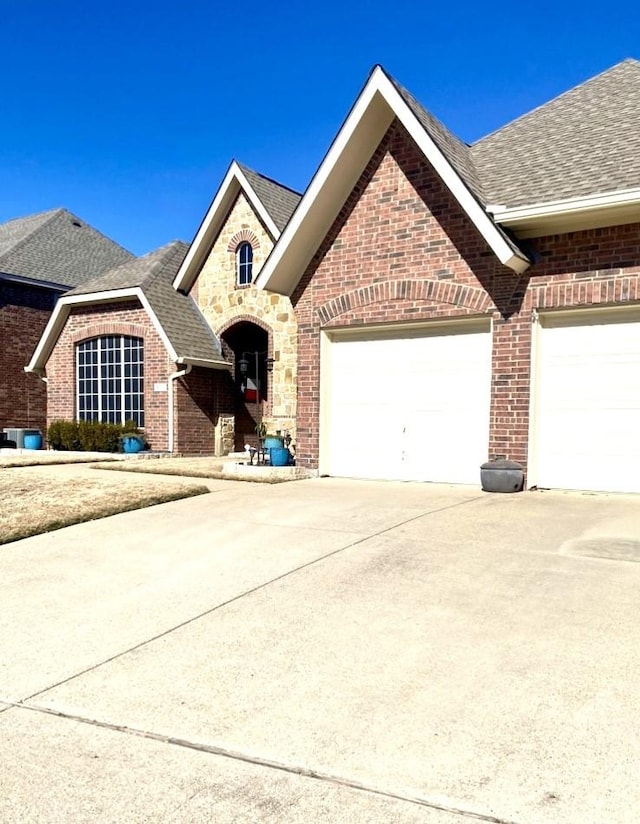 view of front of home with a garage