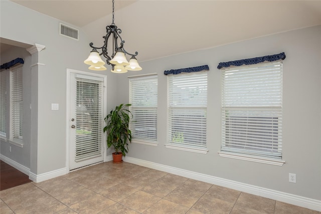 unfurnished dining area featuring lofted ceiling, light tile patterned floors, and a notable chandelier