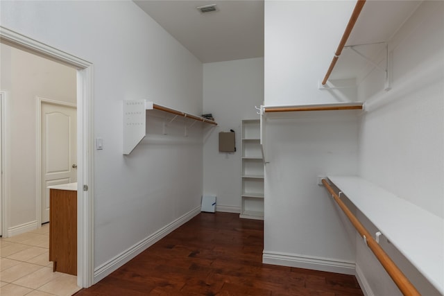 walk in closet featuring wood-type flooring