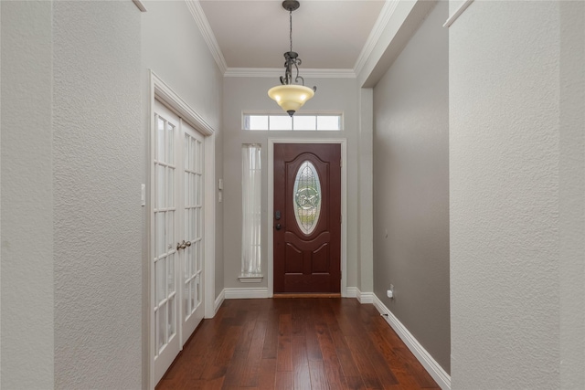 entryway featuring ornamental molding and dark wood-type flooring