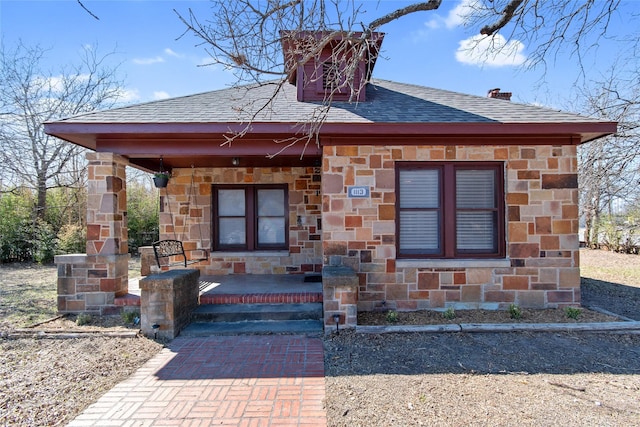 entrance to property with covered porch