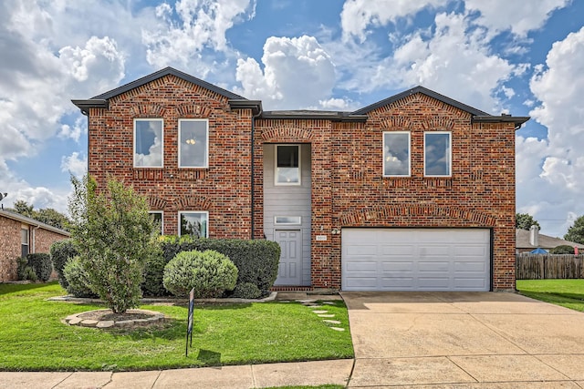 front of property featuring a garage and a front yard