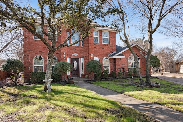 view of front facade with a front yard