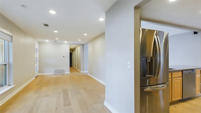 hall featuring light wood-type flooring