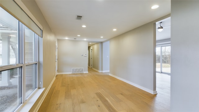 hallway featuring light wood-type flooring