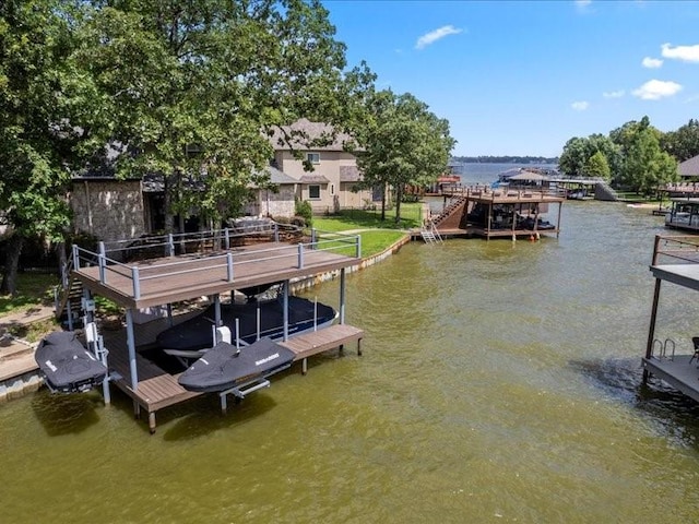 view of dock with a water view and boat lift