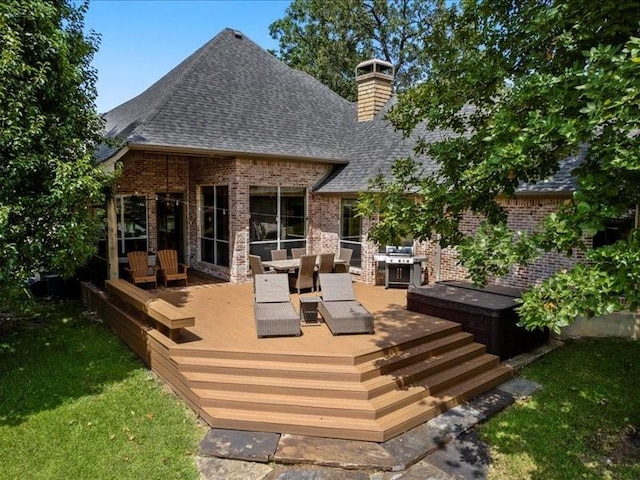 back of house with a wooden deck