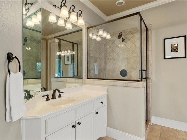 full bathroom with a shower stall, ornamental molding, baseboards, and vanity