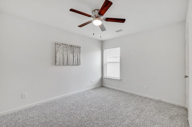 empty room with carpet and ceiling fan