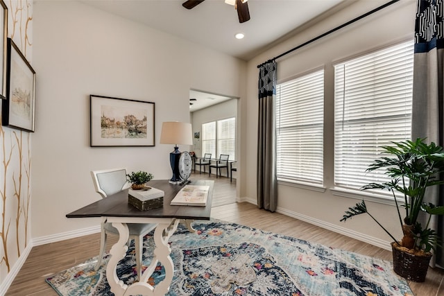 office area with hardwood / wood-style floors and ceiling fan