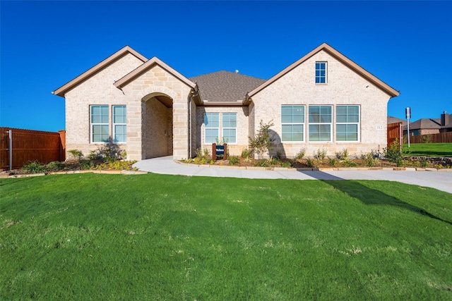 view of front of home with a front lawn