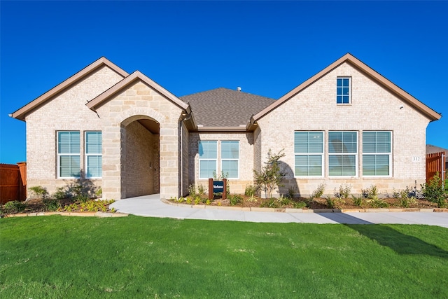 view of front facade with a front lawn