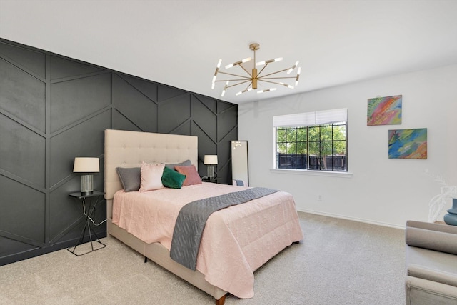 carpeted bedroom featuring an inviting chandelier