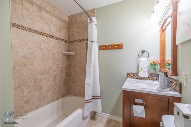 full bathroom with vanity, tile patterned floors, toilet, and shower / bath combo