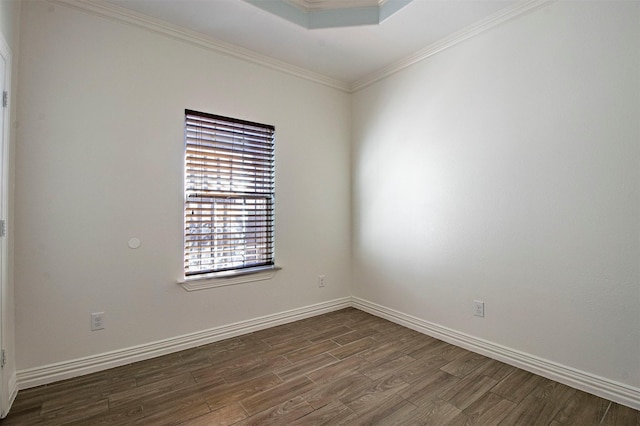 unfurnished room featuring crown molding and dark hardwood / wood-style flooring