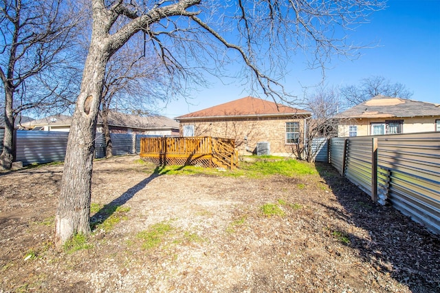 view of yard with a deck