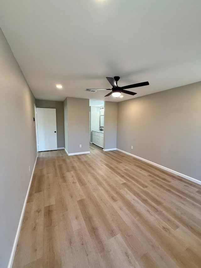 interior space featuring ceiling fan and light hardwood / wood-style floors