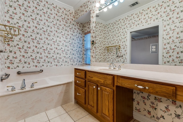 bathroom featuring tile patterned flooring, vanity, crown molding, and a tub