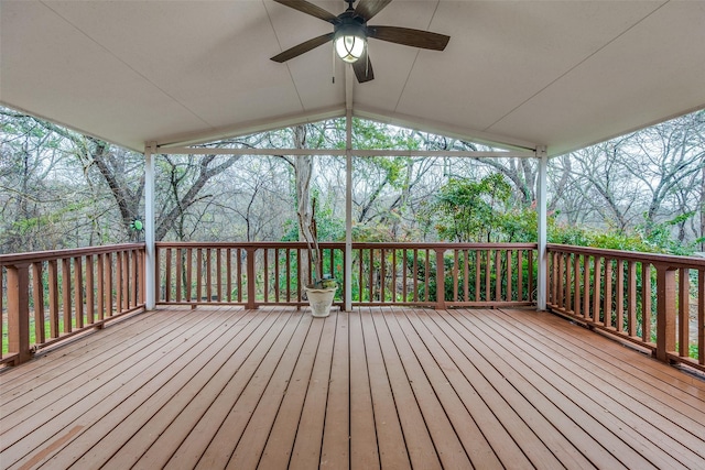 wooden deck featuring ceiling fan