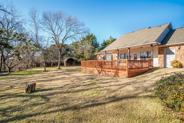 view of yard featuring a deck