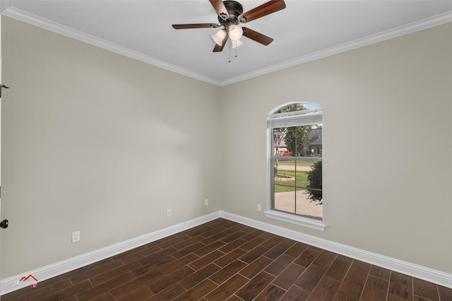 spare room featuring dark hardwood / wood-style flooring, ceiling fan, and ornamental molding