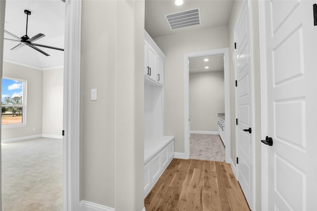 mudroom featuring ceiling fan and light hardwood / wood-style flooring