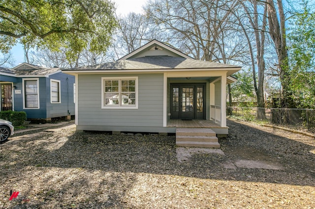 bungalow featuring french doors