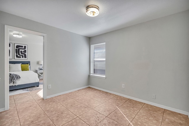 view of tiled spare room