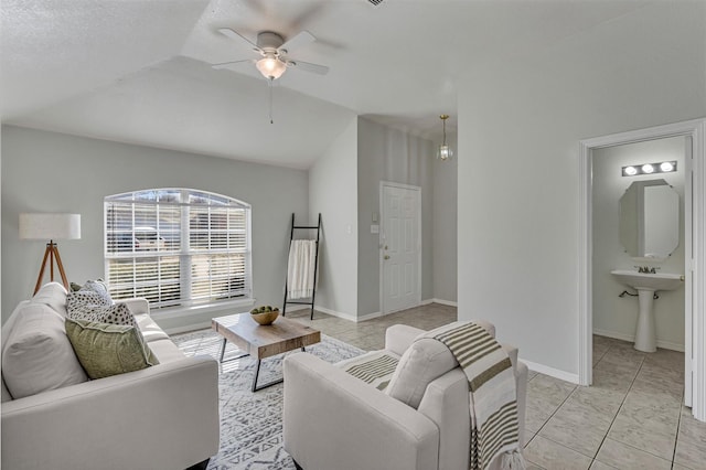 living room with lofted ceiling and ceiling fan