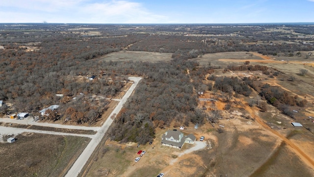 birds eye view of property featuring a rural view