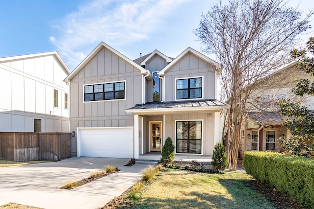 8010 Eagle Trl, Dallas, TX 75238 - modern farmhouse style home featuring a garage, driveway, a standing seam roof, board and batten siding, and metal roof