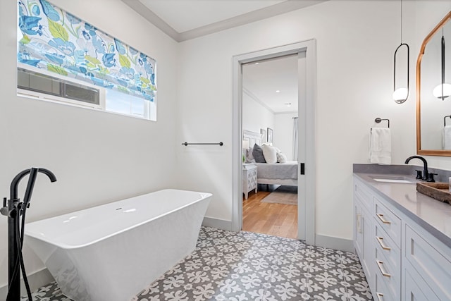 8010 Eagle Trl, Dallas, TX 75238 - ensuite bathroom with vanity, a freestanding bath, and baseboards
