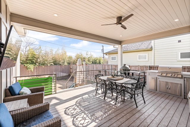 8010 Eagle Trl, Dallas, TX 75238 - wooden deck featuring outdoor dining area, a fenced backyard, and a ceiling fan