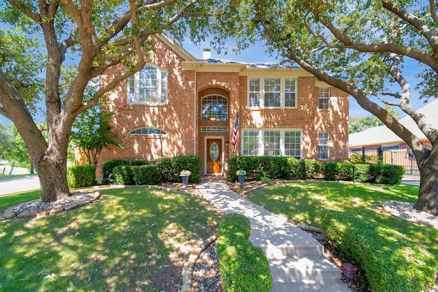 view of front of home with a front lawn