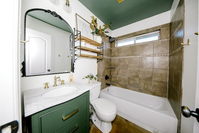 full bathroom with tiled shower / bath, vanity, and toilet