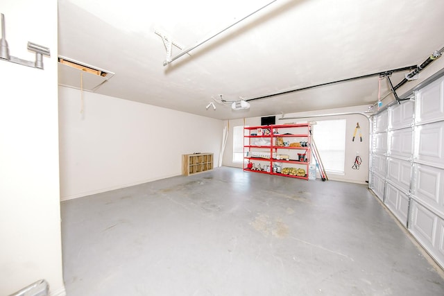 garage featuring a garage door opener