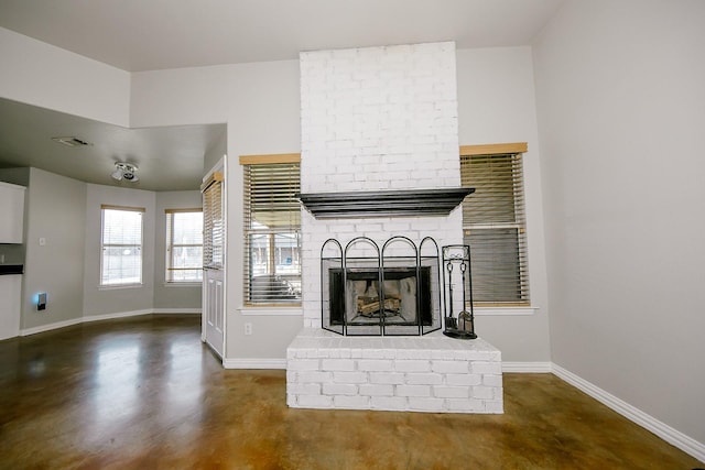 unfurnished living room featuring a fireplace