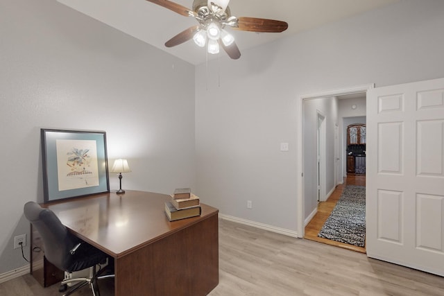 office area with ceiling fan and light hardwood / wood-style flooring