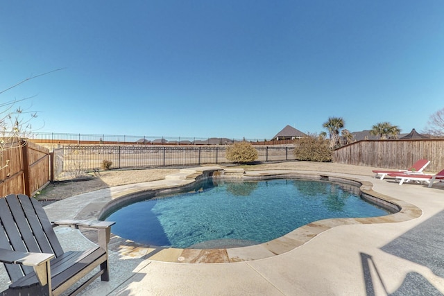 view of swimming pool featuring a patio