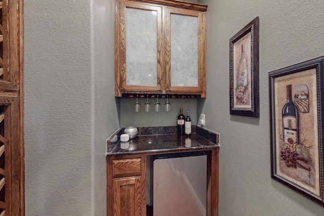 bar with dark stone counters