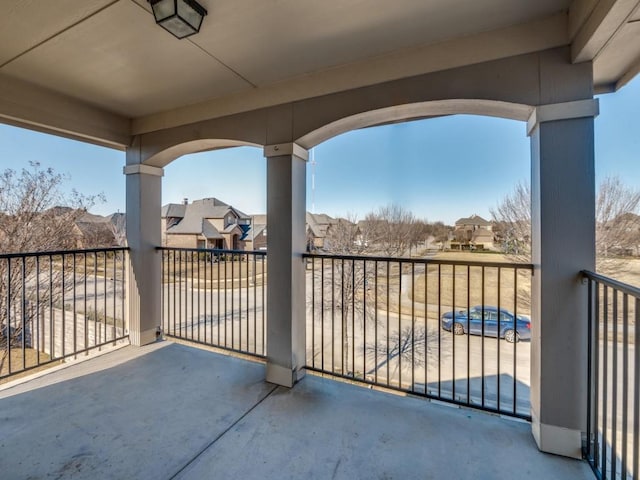 balcony featuring a residential view