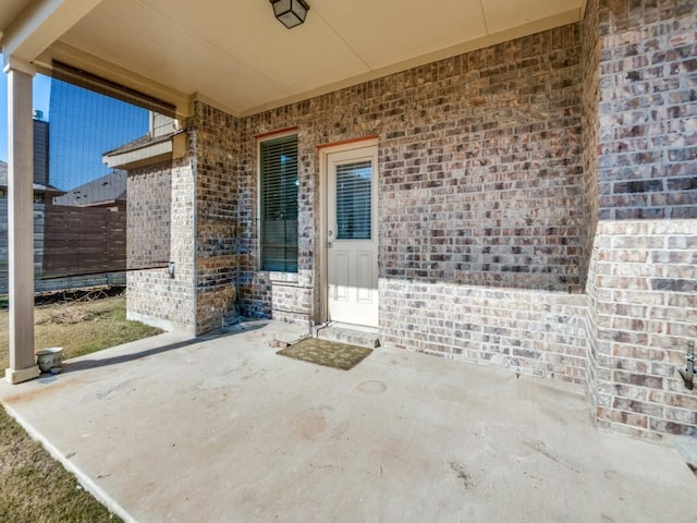 view of patio / terrace with fence