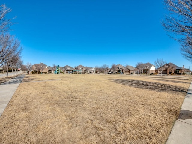 view of yard featuring a residential view