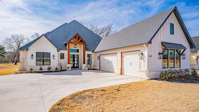 modern farmhouse style home featuring a garage