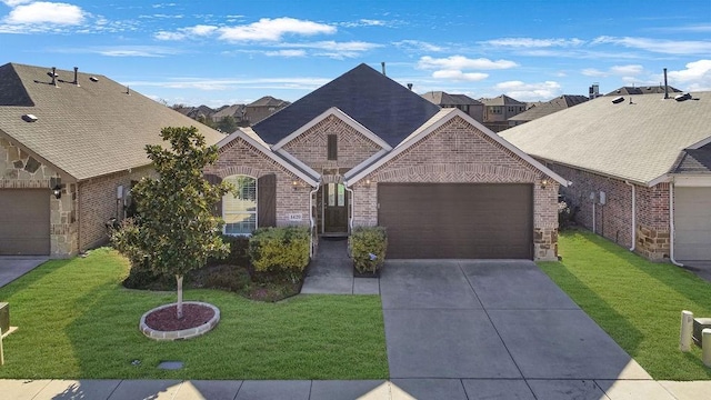 ranch-style house featuring a garage and a front yard