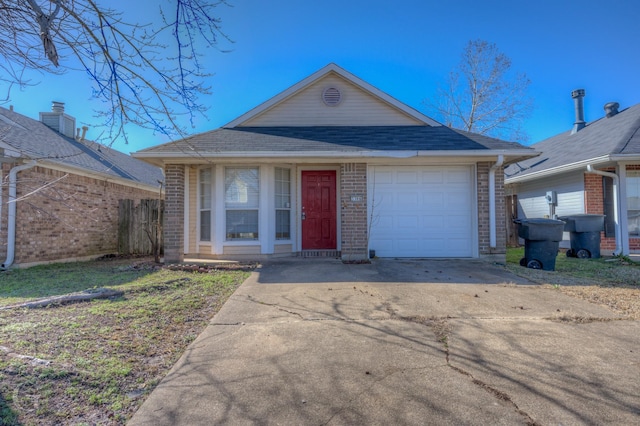 ranch-style home with a garage